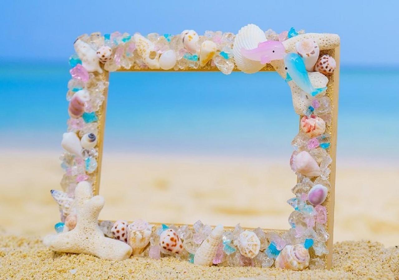 Hotel Monterey Okinawa Spa & Resort Onna Eksteriør bilde A seashell frame